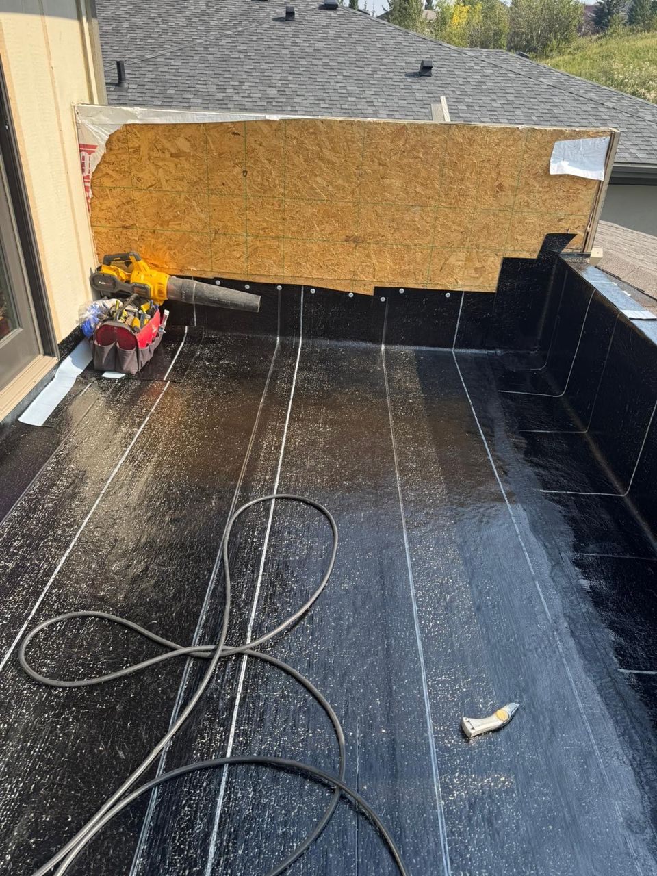 Walk-out balcony SBS base sheet turned up the walls